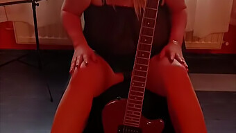 Milf With Biggest Tits Playing Guitar And Touching Herself