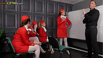 A Group Of Dominating Flight Attendants In Nylon Uniforms Performing Oral Sex On A Man